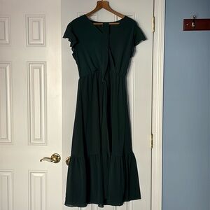 Hunter Green Dress by Fashion with lining on skirt area. Perfect for anything!